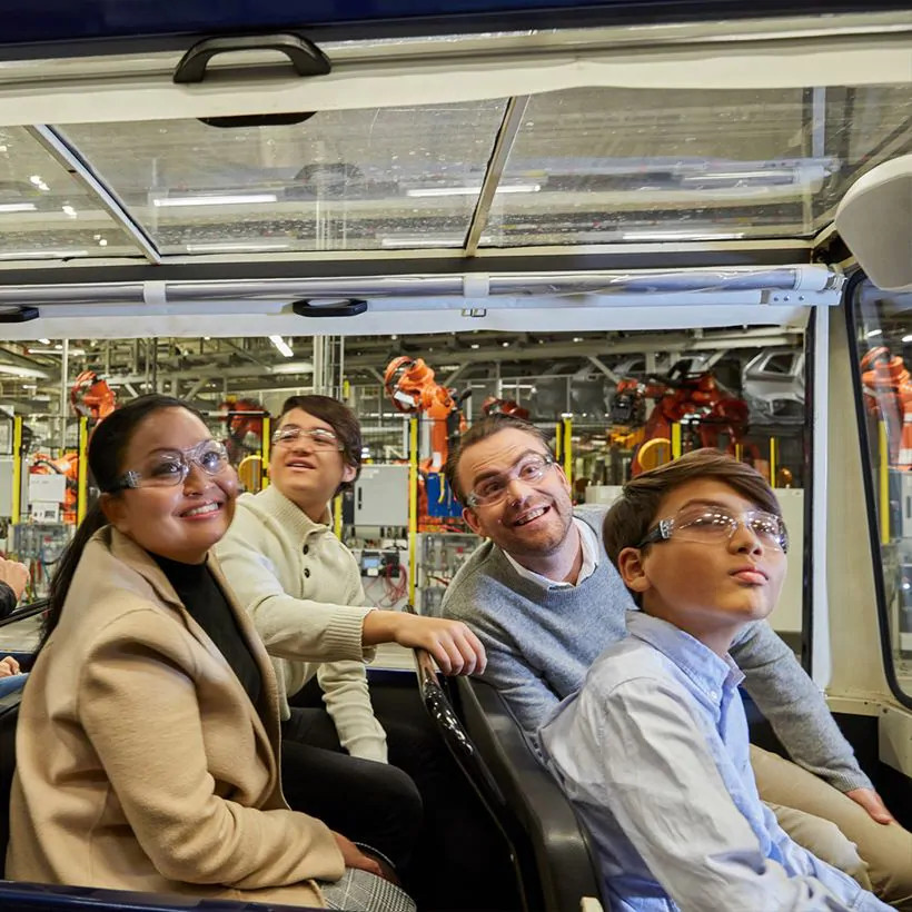 four people smiling